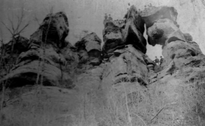 Picnickers scale the Devil's Tea Table in the early 1900s.